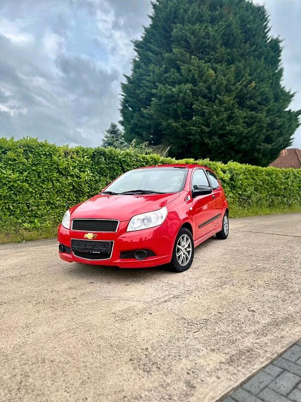 Rot Gebraucht 2009 Chevrolet Aveo Kleinwagen | 1.699 € - Bild 1/4