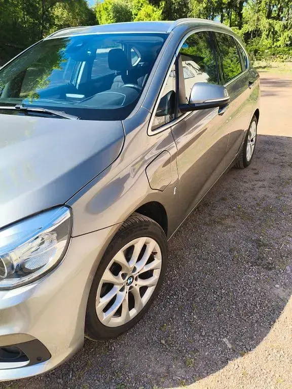 Używany BMW 225 Active Tourer iPerformance 224 KM (164 kW) 2017 Złoty Minivan