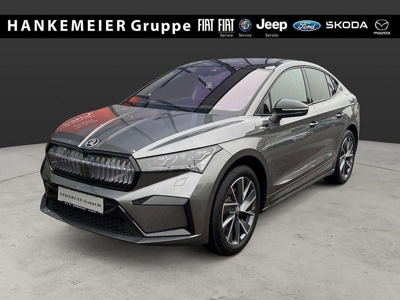 Grau Gebraucht 2024 Skoda Enyaq iV SportLine SUV | 37.890 € (Teuer) - Bild 1/4