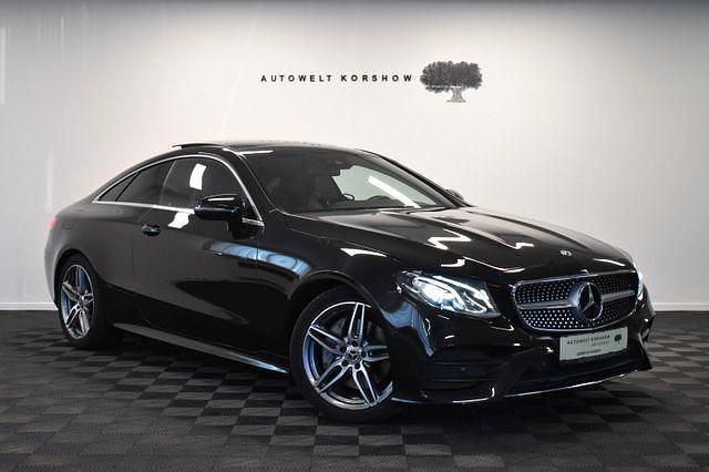 Schwarz Gebraucht 2017 Mercedes E200 AMG line Coupé | 32.200 € (Etwas zu teuer) - Bild 1/3