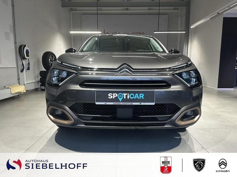 Gebraucht Citroën e-C4 100 kW (136 PS) 2023 Platinium grau Limousine