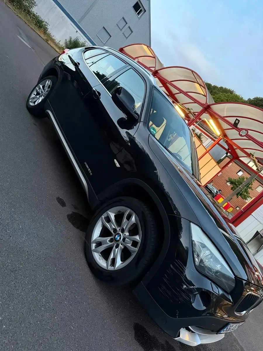 Gebraucht BMW X1 176 PS (129 kW) 2011 Schwarz SUV