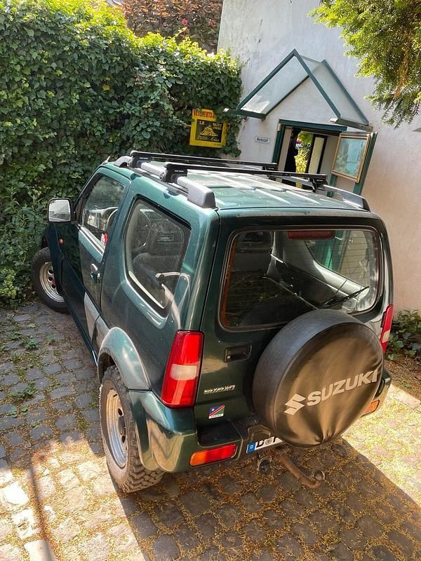 Grün Gebraucht 2000 Suzuki Jimny SUV | 5.500 € (Fairer Preis) - Bild 1/4