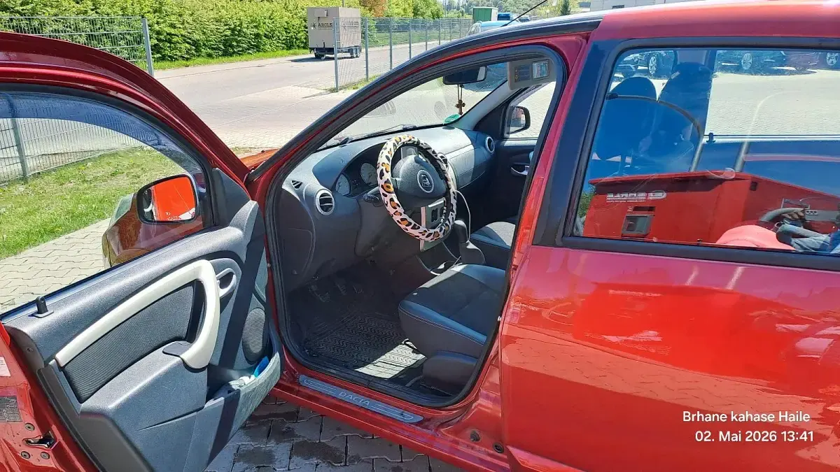Second-hand Dacia Sandero 84 CP (61 kW) 2012 Roșu Break