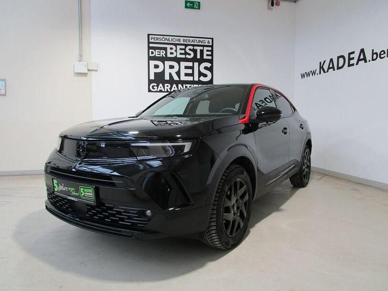 Gebraucht Opel Mokka 131 PS (96 kW) 2022 Diamant schwarz/karbon schwarz (metallic) SUV