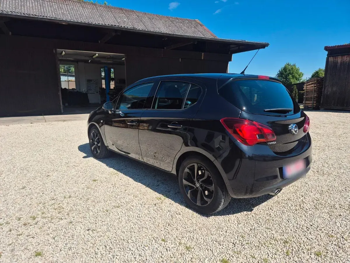 Używany Opel Corsa 101 KM (74 kW) 2015 Czarny Hatchback