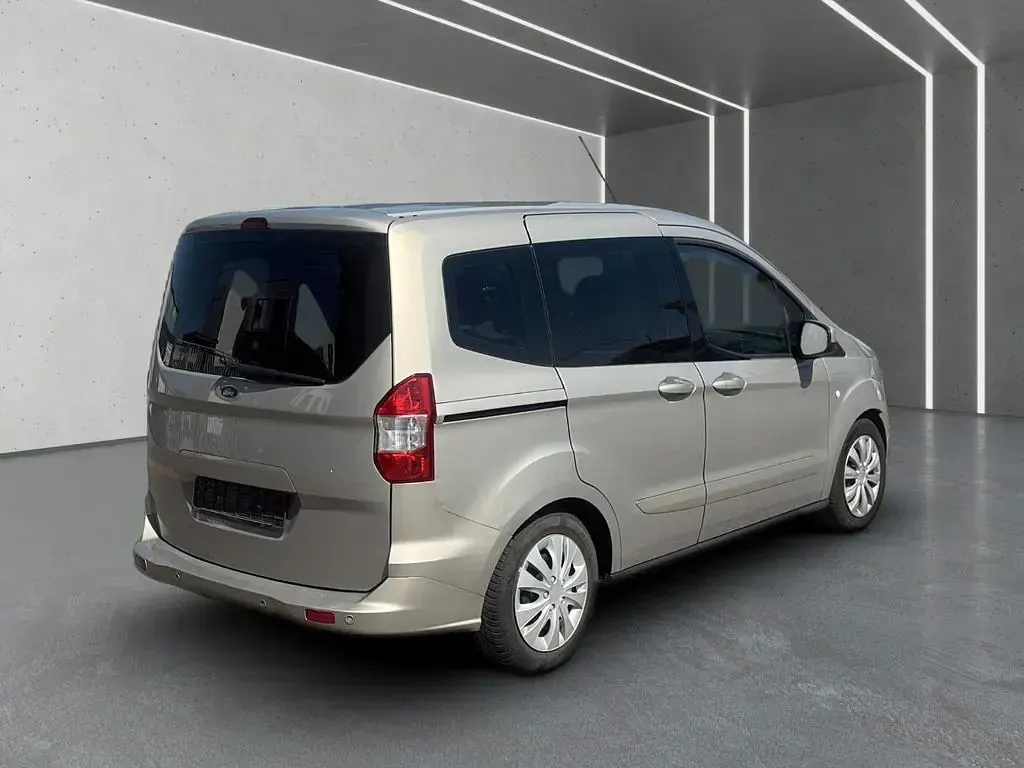 Gebraucht Ford Tourneo Courier Ambiente 101 PS (74 kW) 2015 Gold Van / Kleinbus