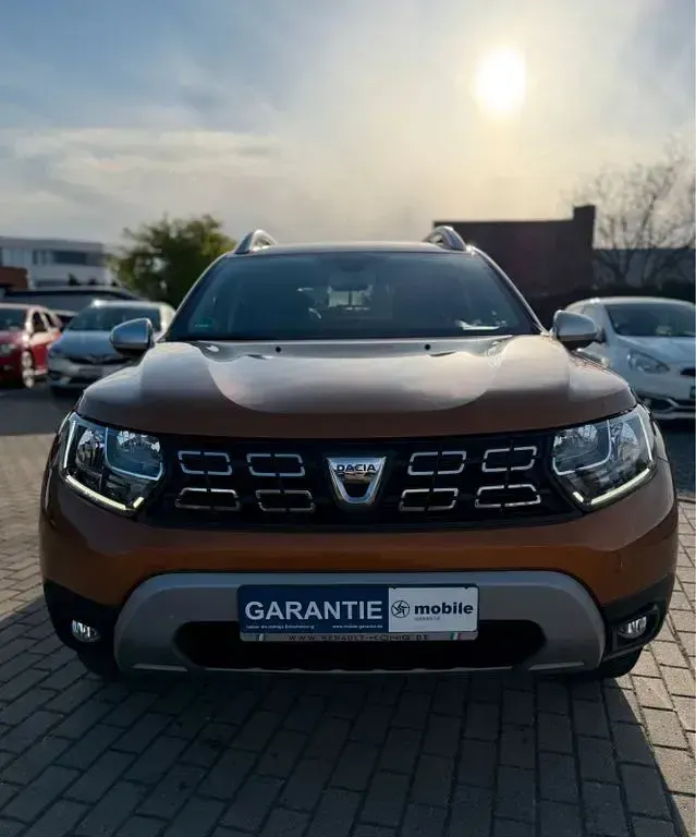Używany Dacia Duster Comfort 125 KM (91 kW) 2018 Pomarańczowy SUV