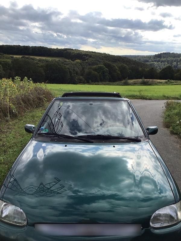 Gebraucht Ford Escort Cabriolet 90 PS (66 kW) 1998 Grün Cabrio