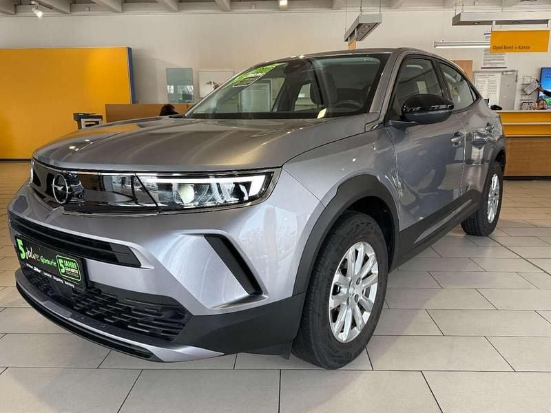 Gebraucht Opel Mokka Edition 131 PS (96 kW) 2023 Kontrast grau/quarz silber SUV
