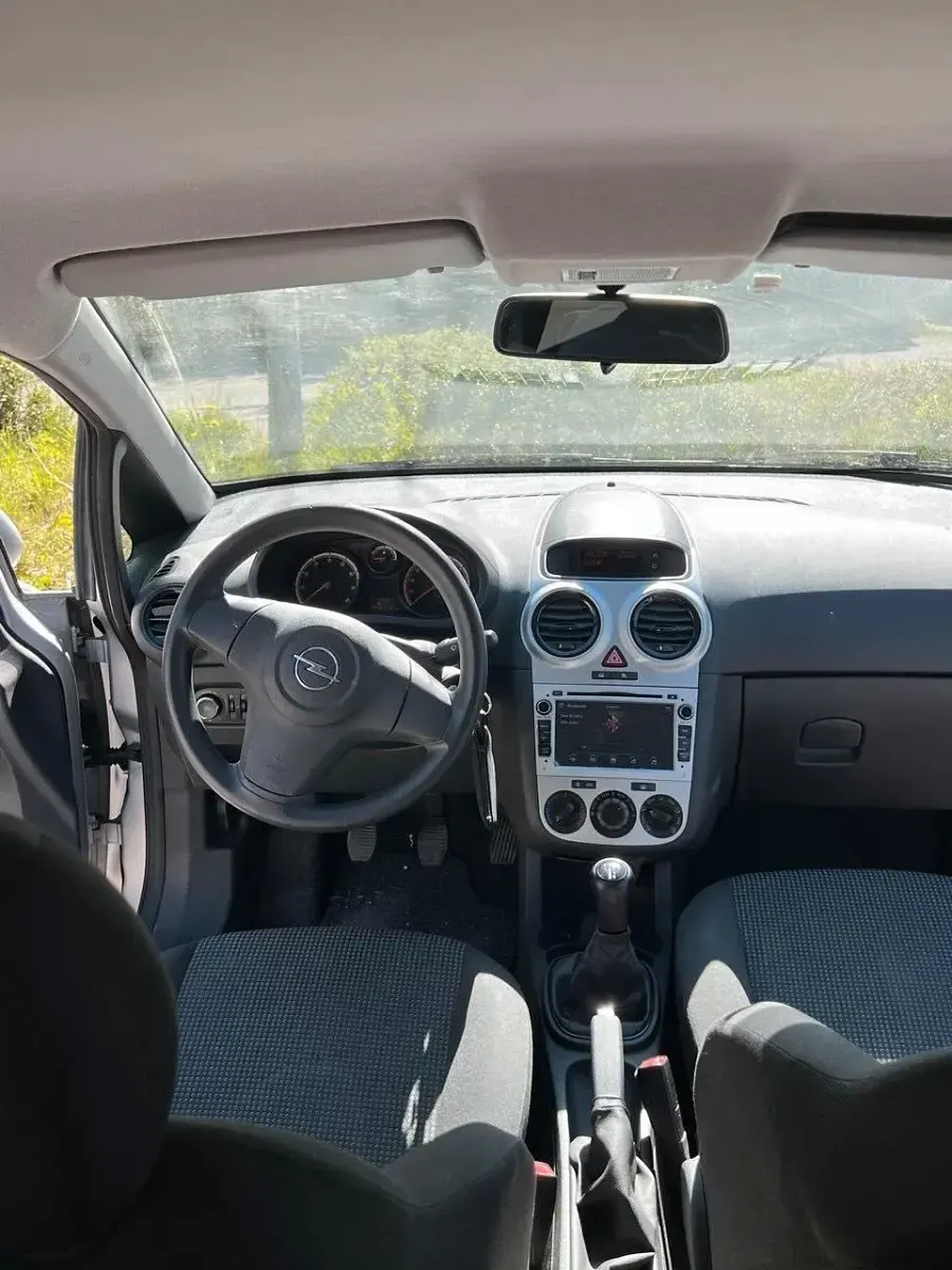 Gebraucht Opel Corsa 70 PS (51 kW) 2011 Grau Kleinwagen