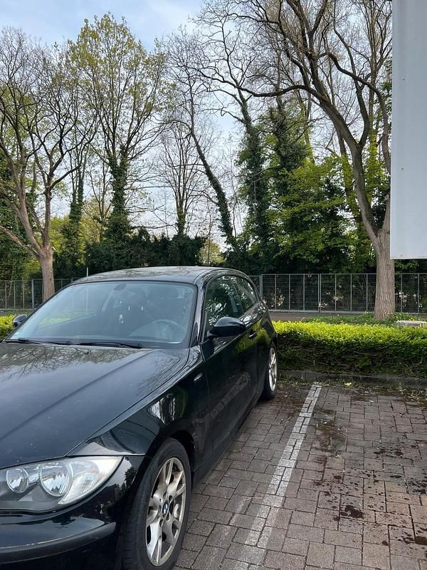 Second-hand BMW 116 122 CP (89 kW) 2010 Negru Hatchback