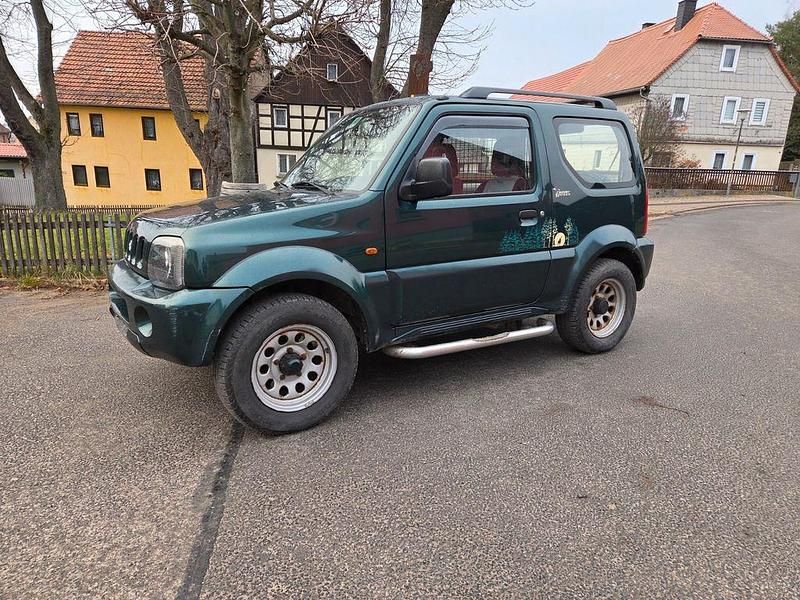 Grün Gebraucht 2004 Suzuki Jimny SUV | 2.999 € (Superpreis) - Bild 1/4