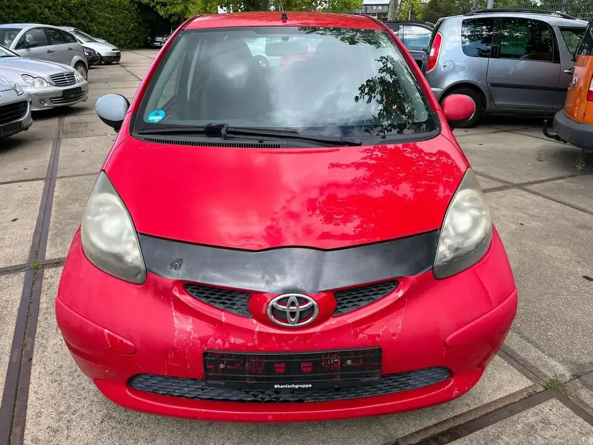 Gebraucht Toyota Aygo 68 PS (50 kW) 2007 Rot Kleinwagen