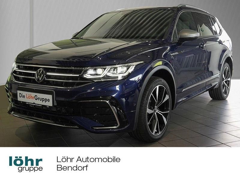 Atlantic blue metallic Gebraucht 2024 VW Tiguan Allspace R-line SUV | 42.980 € (Guter Preis) - Bild 1/4