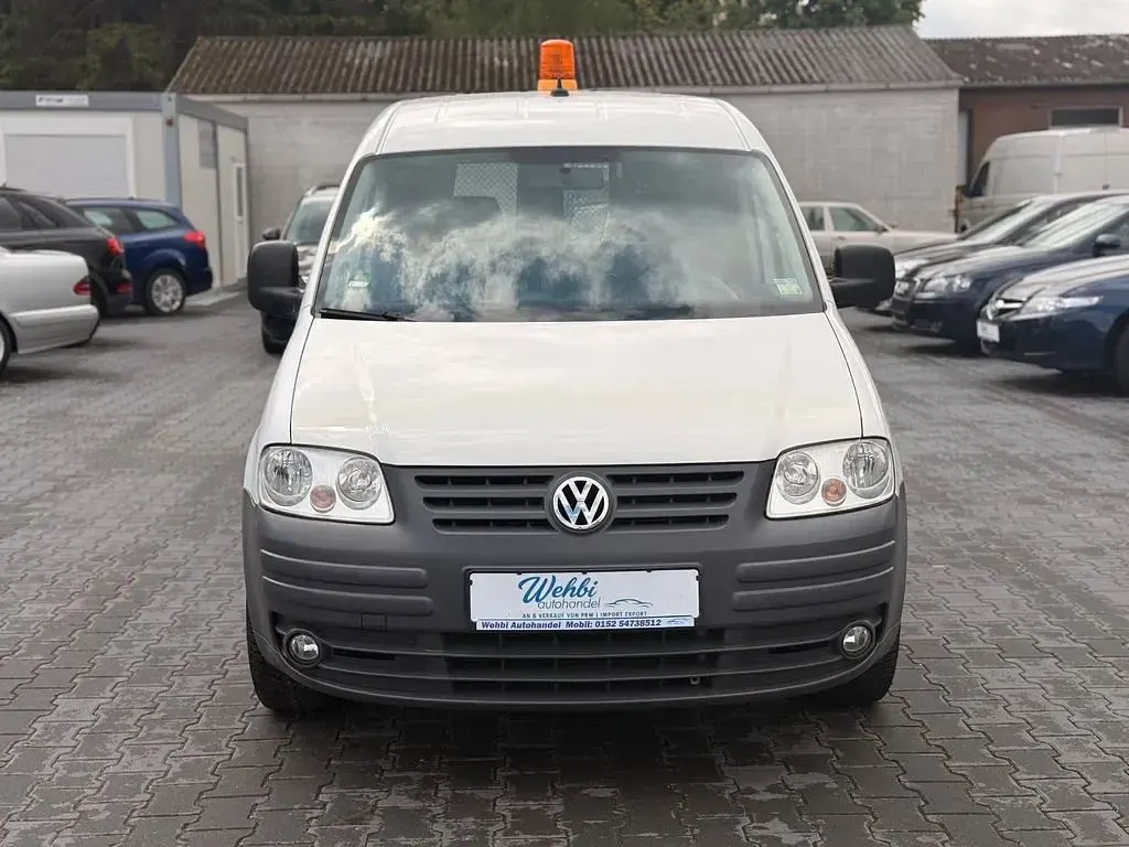 Używany VW Caddy 109 KM (80 kW) 2010 Biały Minivan