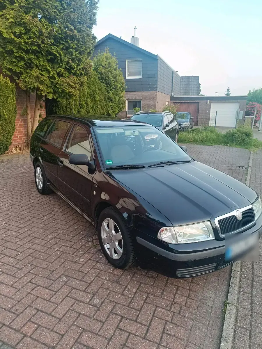 Używany Skoda Octavia 102 KM (75 kW) 2002 Czarny Kombi