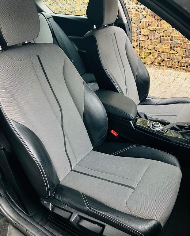 Second-hand BMW 116 Efficient Dynamics 116 CP (85 kW) 2013 Negru Hatchback