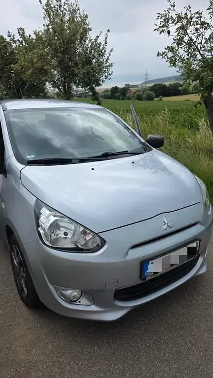 Gebraucht Mitsubishi Space Star Plus 71 PS (52 kW) 2014 Silber Van / Kleinbus