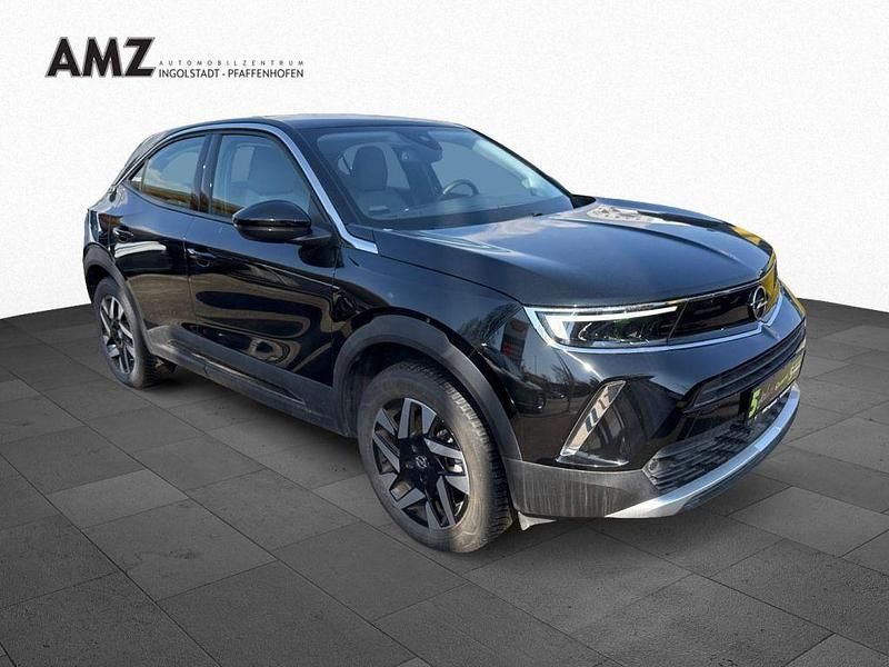 Gebraucht Opel Mokka-e Elegance 100 kW (136 PS) 2022 Diamant schwarz/karbon schwarz (metallic) SUV