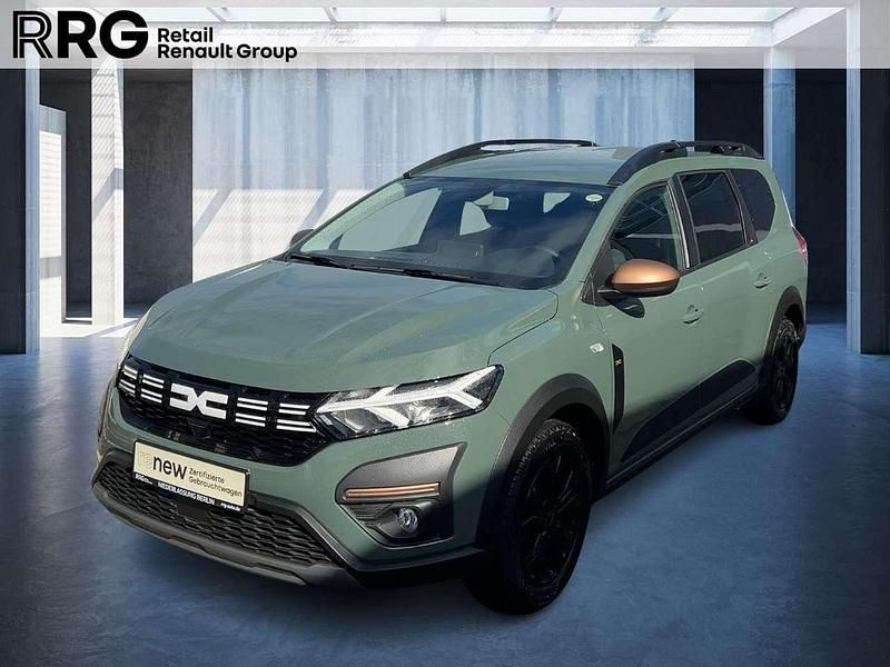 Safarigrüngrau Gebraucht 2024 Dacia Jogger Extreme Van / Kleinbus | 22.790 € (Fairer Preis) - Bild 1/3
