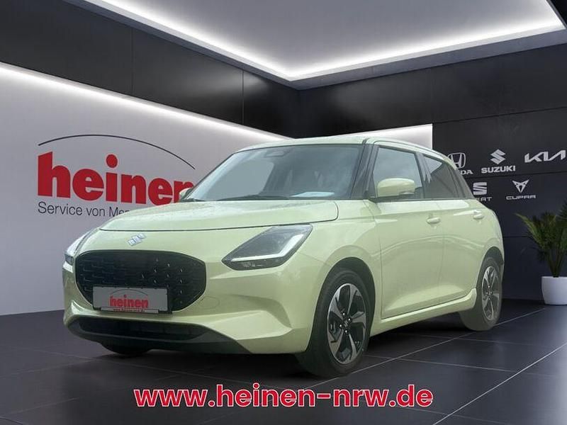Orange (flame orange pearl metallic) Gebraucht 2024 Suzuki Swift Comfort+ Kleinwagen | 21.480 € (Etwas zu teuer) - Bild 1/4