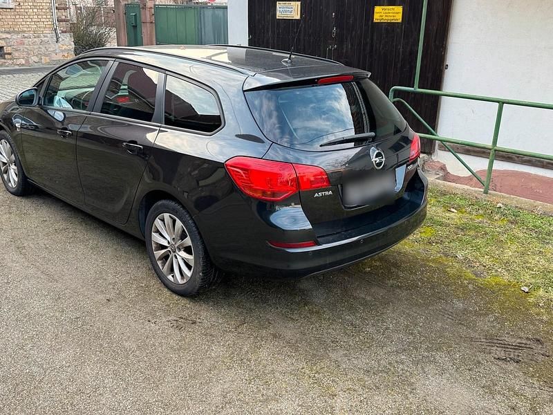 Gebraucht Opel Astra 110 PS (80 kW) 2012 Schwarz Kombi