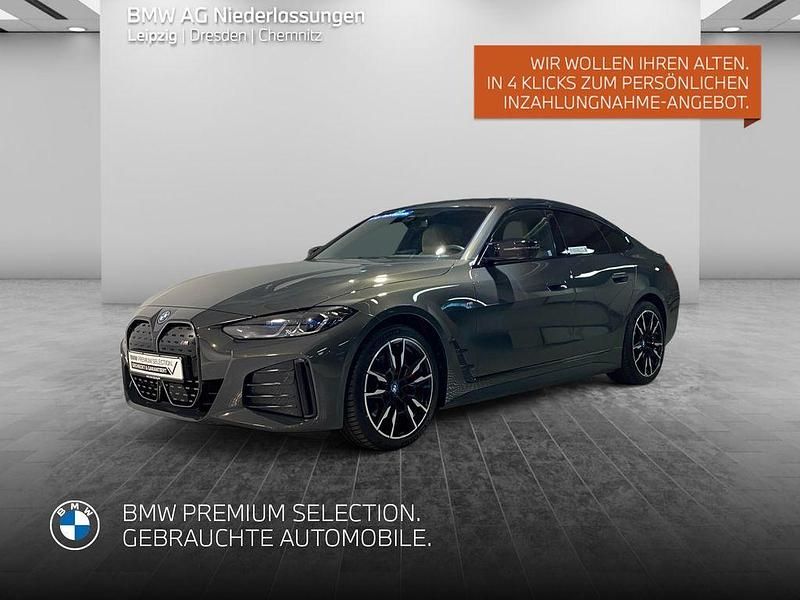 Grau Gebraucht 2024 BMW i4 Shadowline Limousine | 62.407 € - Bild 1/2