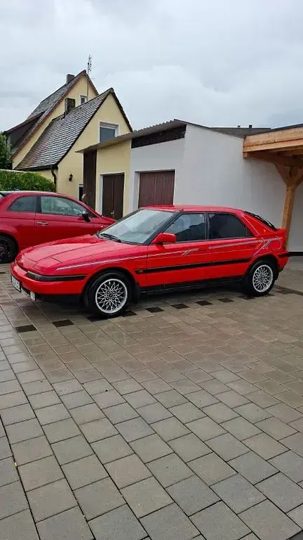 Gebraucht Mazda 323F 88 PS (64 kW) 1991 Rot Limousine