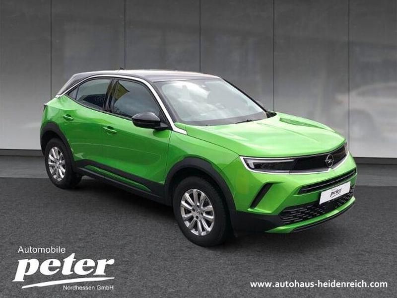 Gebraucht Opel Mokka Enjoy 101 PS (74 kW) 2024 Lackierung matcha green/typ aussenverkle (metallic) SUV