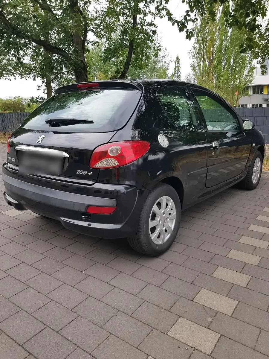 Gebraucht Peugeot 206+ 75 PS (55 kW) 2009 Schwarz Kleinwagen