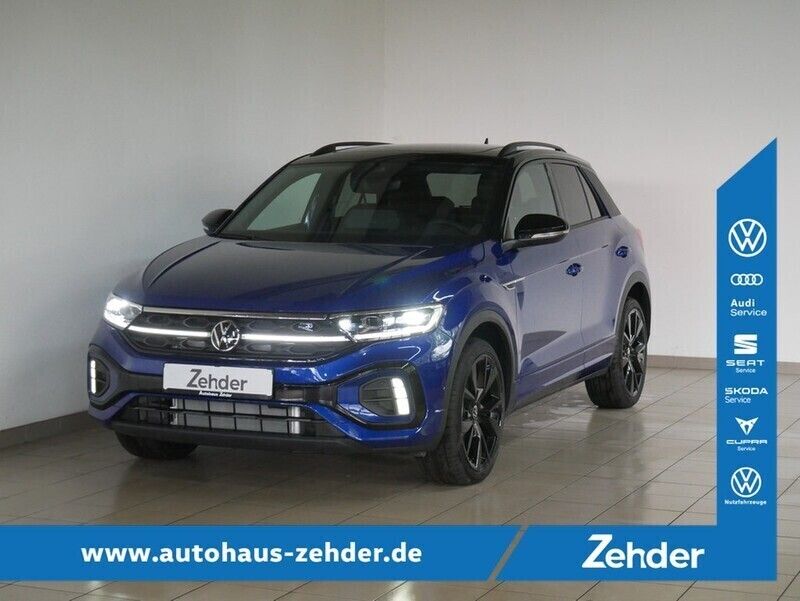 Lapiz blue metallic schwarz Gebraucht 2024 VW T-Roc R-line SUV | 39.916 € (Etwas zu teuer) - Bild 1/4