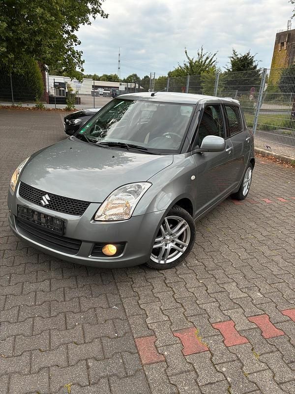 Silber Gebraucht 2009 Suzuki Swift Club Kleinwagen | 2.190 € (Superpreis) - Bild 1/4