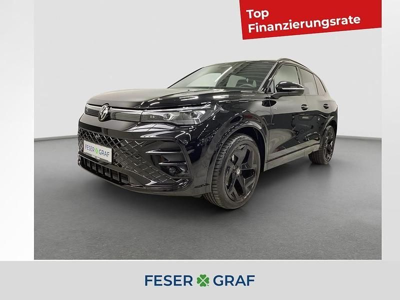 Grenadillschwarz metallic Gebraucht 2025 VW Tiguan R-line SUV | 42.290 € (Fairer Preis) - Bild 1/4