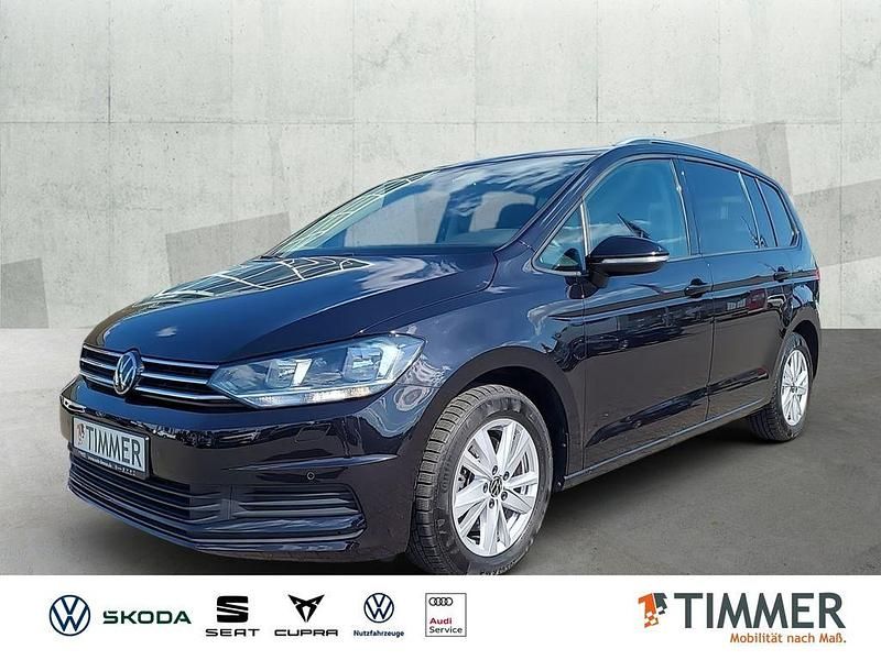 Deep black perleffekt Gebraucht 2024 VW Touran Comfortline Van / Kleinbus | 34.480 € (Fairer Preis) - Bild 1/4