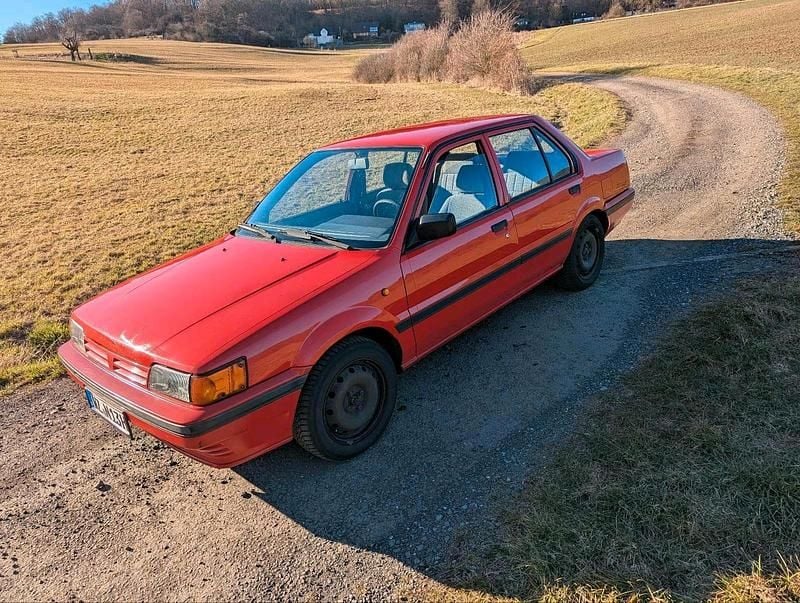 Gebraucht Nissan Sunny 73 PS (53 kW) 1988 Rot Limousine