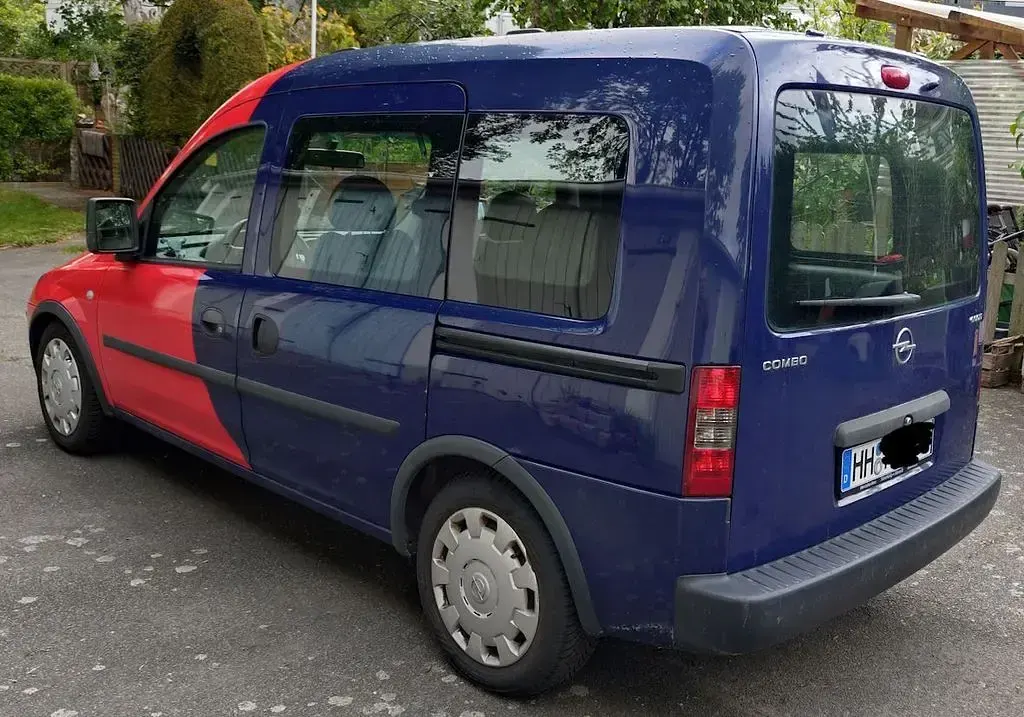 Używany Opel Combo 94 KM (69 kW) 2010 Niebieski Minivan