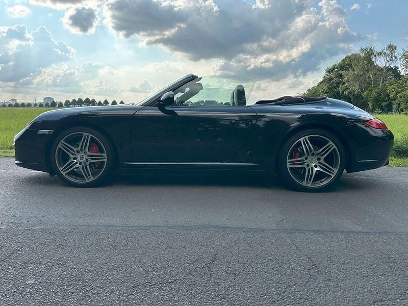Schwarz Gebraucht 2009 Porsche 911 Carrera 4S Cabriolet Cabrio | 77.500 € (Fairer Preis) - Bild 1/4