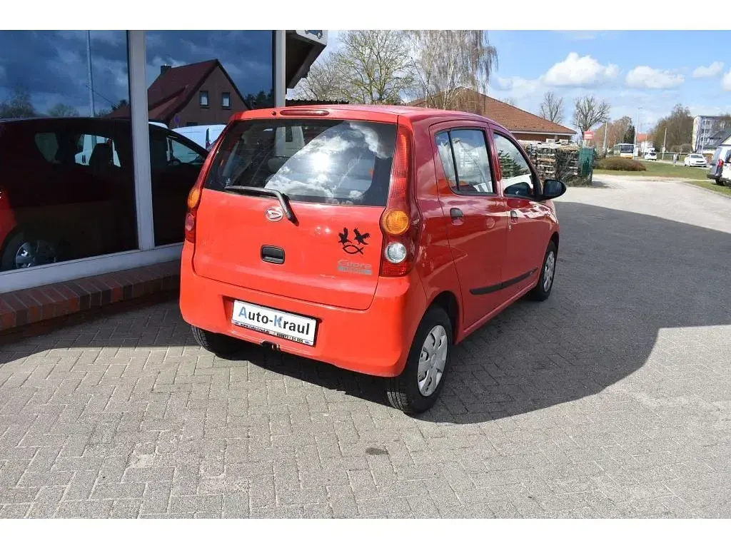 Gebraucht Daihatsu Cuore 69 PS (50 kW) 2010 Rot Kleinwagen