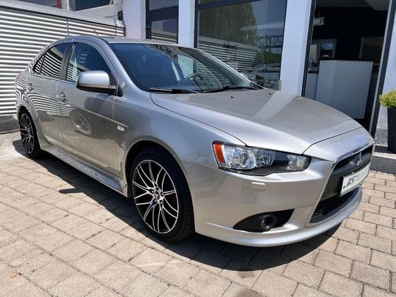 Merkursilber (m) (metallic) Gebraucht 2014 Mitsubishi Lancer Limousine | 6.950 € (Fairer Preis) - Bild 1/4