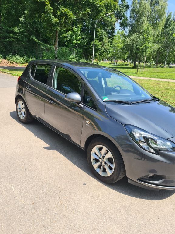 Grau Gebraucht 2016 Opel Corsa Edition Kleinwagen | 8.990 € (Fairer Preis) - Bild 1/4