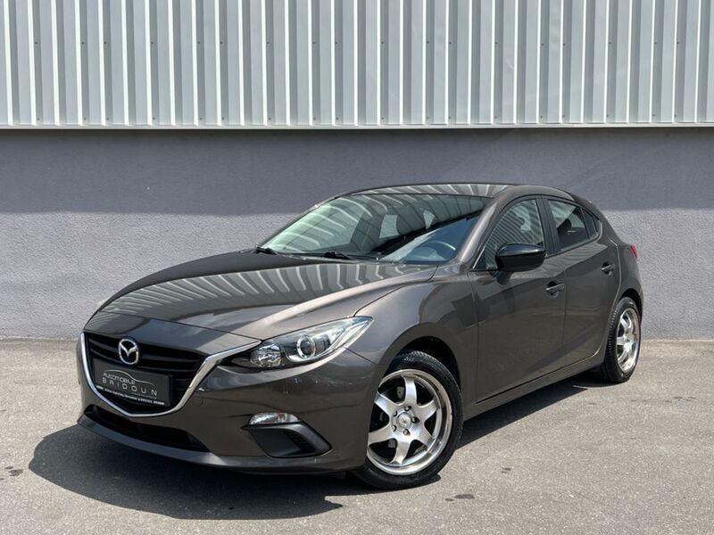 Grau Gebraucht 2014 Mazda 3 Prime-Line Limousine | 6.490 € (Fairer Preis) - Bild 1/4