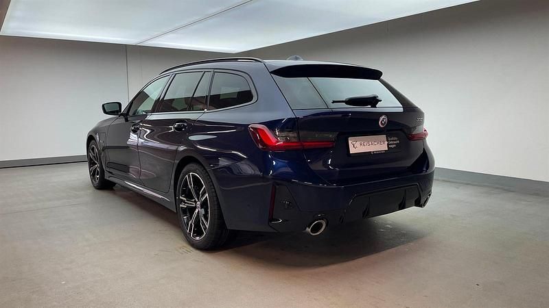 Gebraucht BMW 330e Efficient Dynamics 292 PS (214 kW) 2022 Bmw individual tansanitblau met Kombi