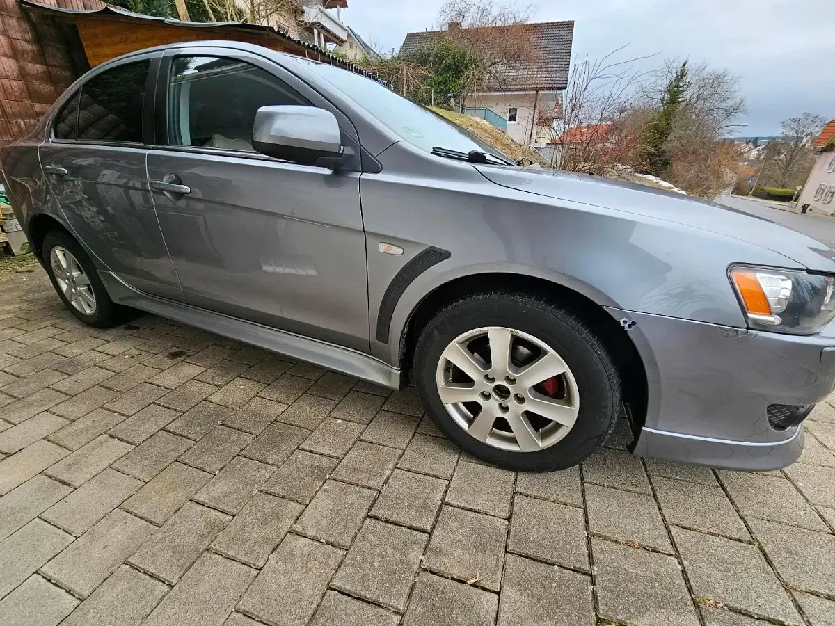Gebraucht Mitsubishi Lancer 150 PS (110 kW) 2012 Silber Limousine
