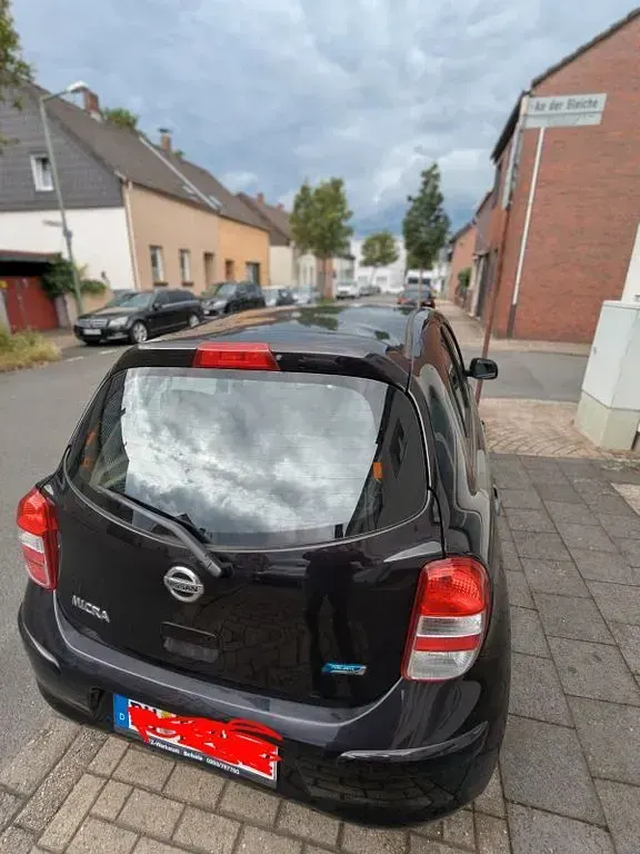 Gebraucht Nissan Micra 80 PS (58 kW) 2011 Schwarz Kleinwagen