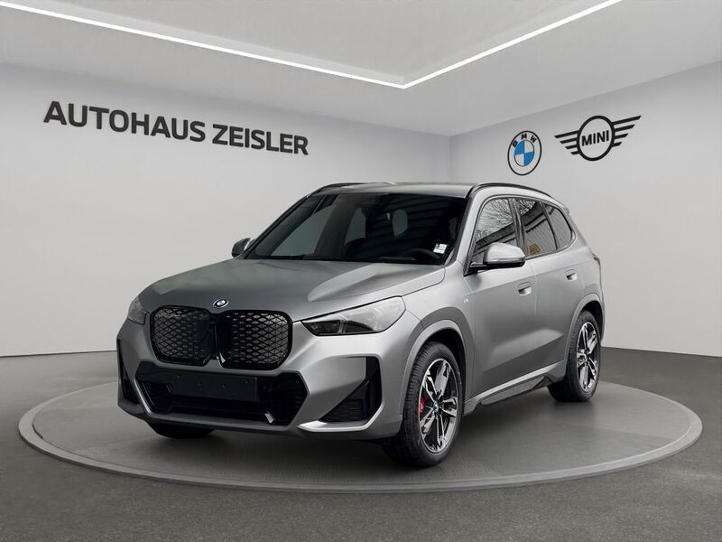 Grau Neu 2025 BMW iX1 M Sport SUV | 52.900 € (Guter Preis) - Bild 1/4