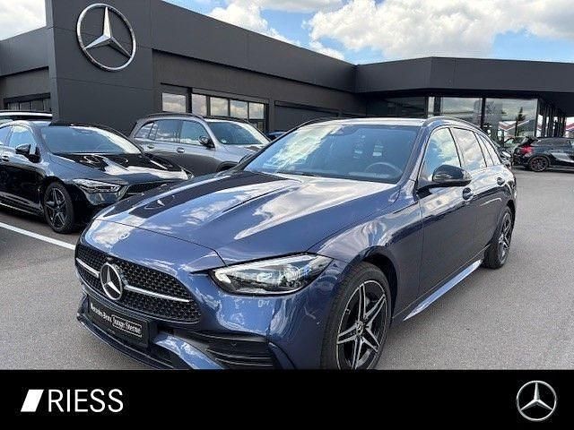 Metalliclack sodalithblau Gebraucht 2024 Mercedes C300e AMG Kombi | 41.440 € (Superpreis) - Bild 1/4