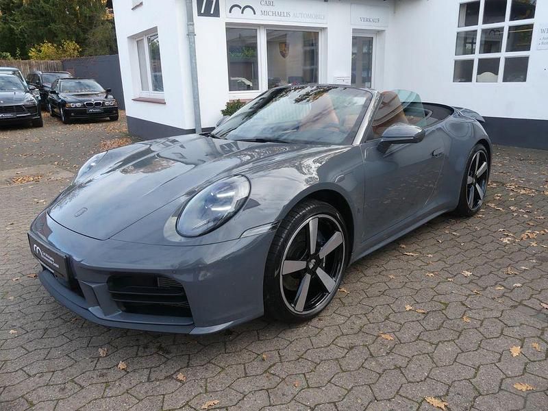 Grau Gebraucht 2024 Porsche 911 Carrera Cabriolet Cabrio | 142.992 € - Bild 1/4