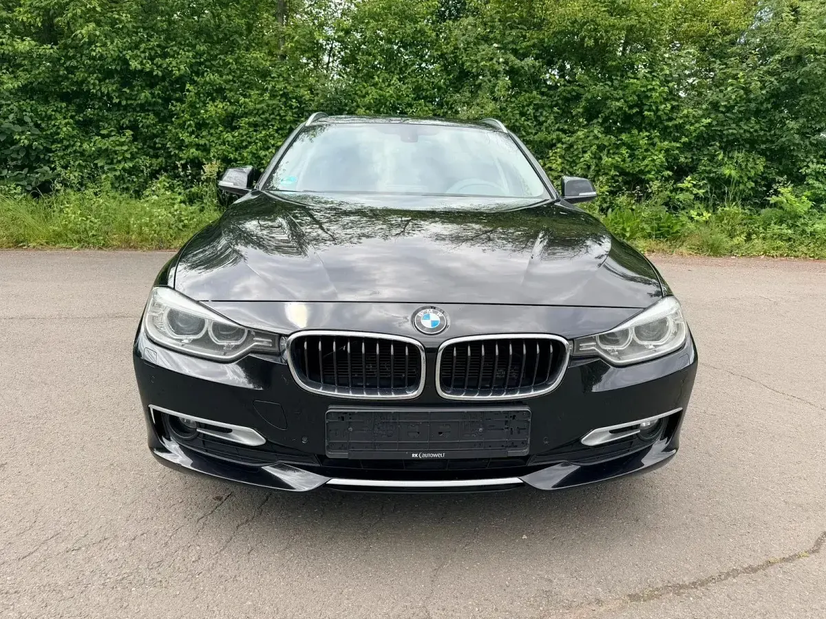 Gebraucht BMW 320 184 PS (135 kW) 2013 Schwarz Kombi