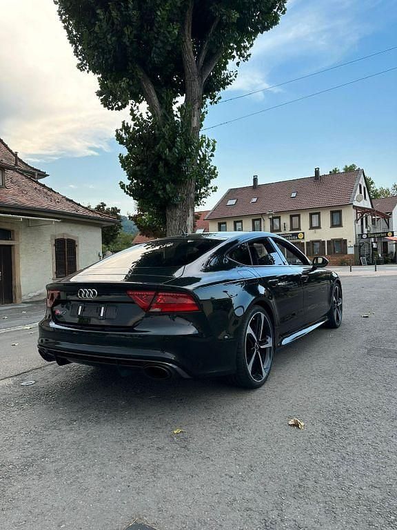 Schwarz Gebraucht 2013 Audi RS7 Sportback Comfort Kleinwagen | 39.500 € - Bild 1/4